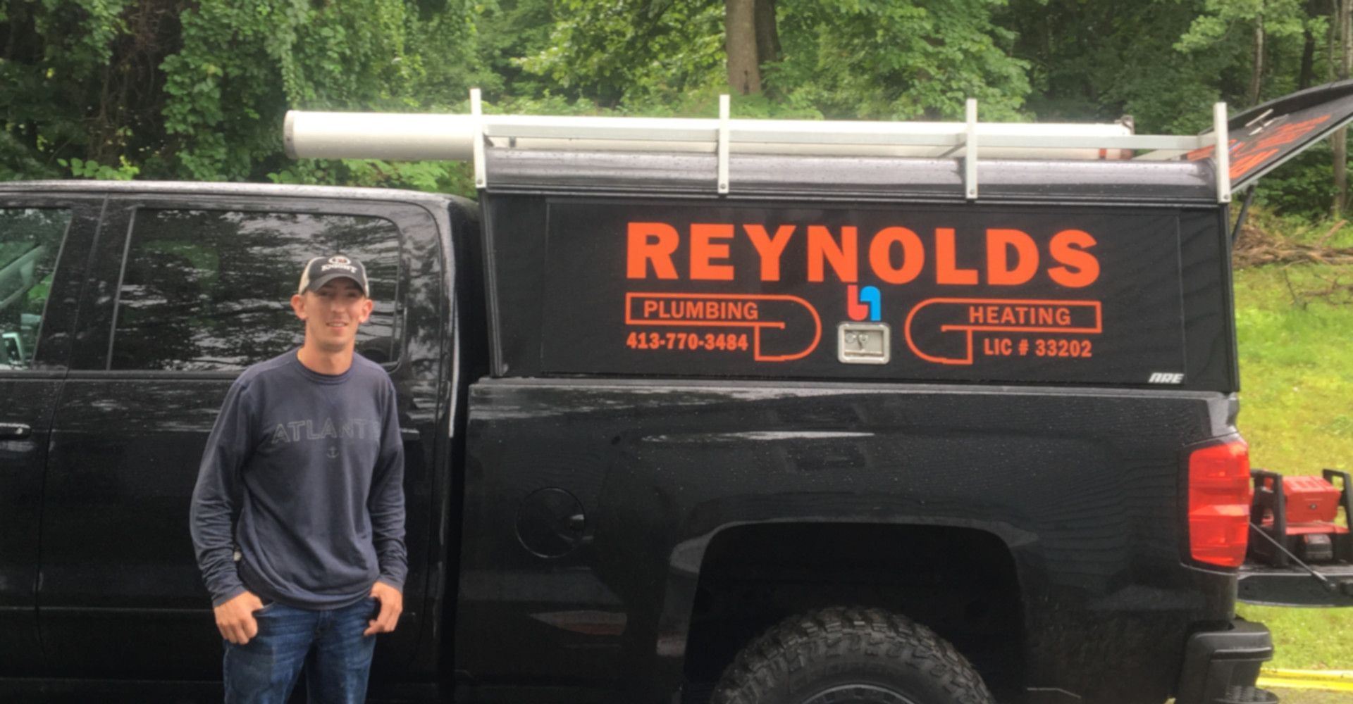 Man Fixing Something | North Adams, MA | Reynolds Plumbing & Heating