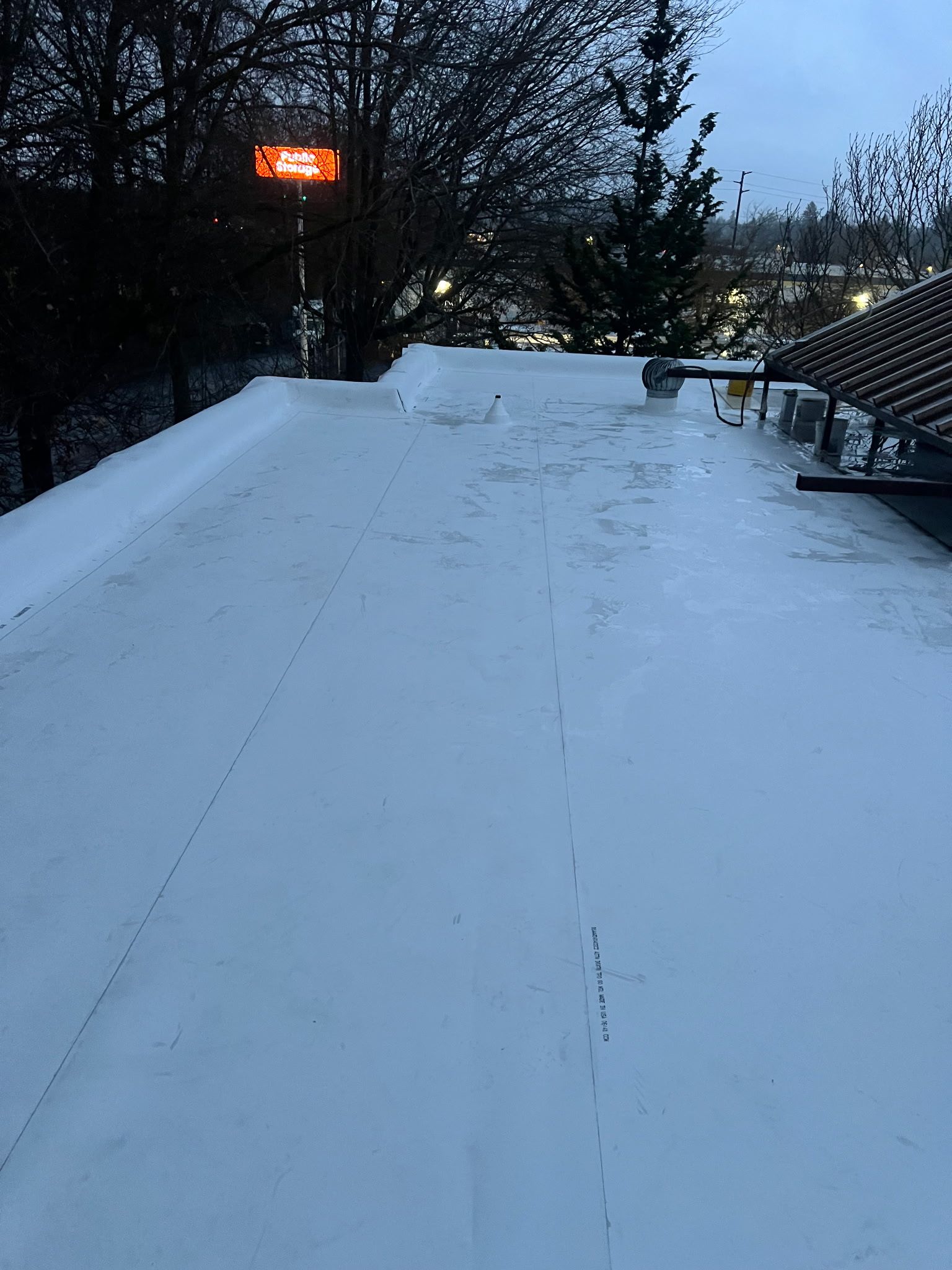 Newly finished commercial roofing project in Portland OR by the Portland Commercial Roofing Pros.