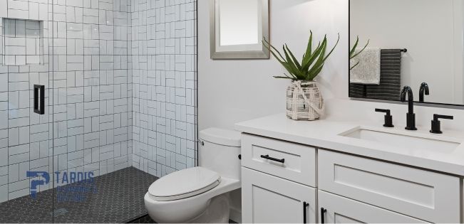 Expert working on a stylish toilet refurbishment in Barnet, installing modern fixtures and finishes.