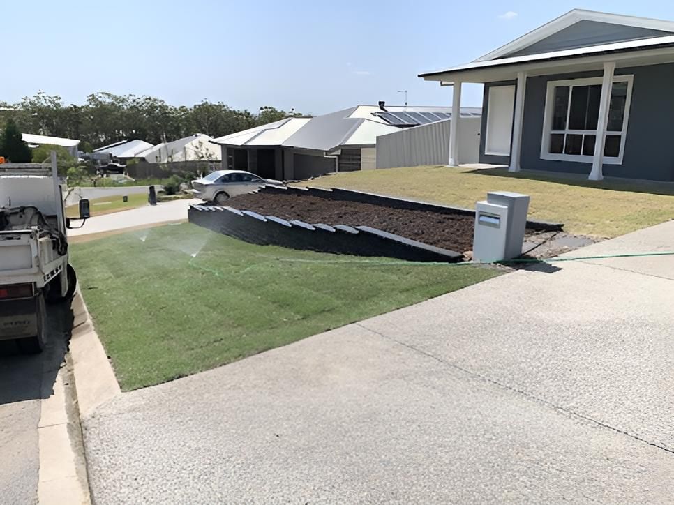 A White Truck Is Parked In Front Of A House — All Aspects Landscaping In Peregian Springs, QLD