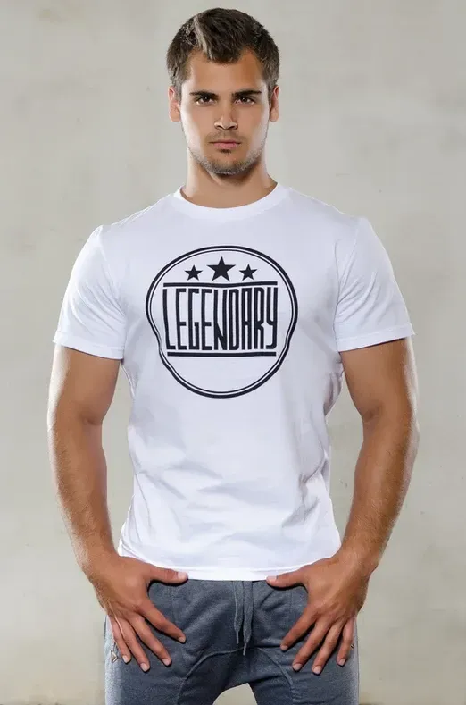A Man is Wearing a White T-shirt That Says Legendary — Bigfoot Customs In Taree, NSW