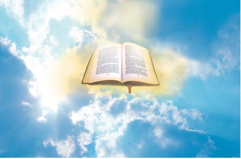 An open bible is floating in the sky.