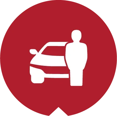 A white silhouette icon of a person standing next to a car, centered on a maroon circular background.
