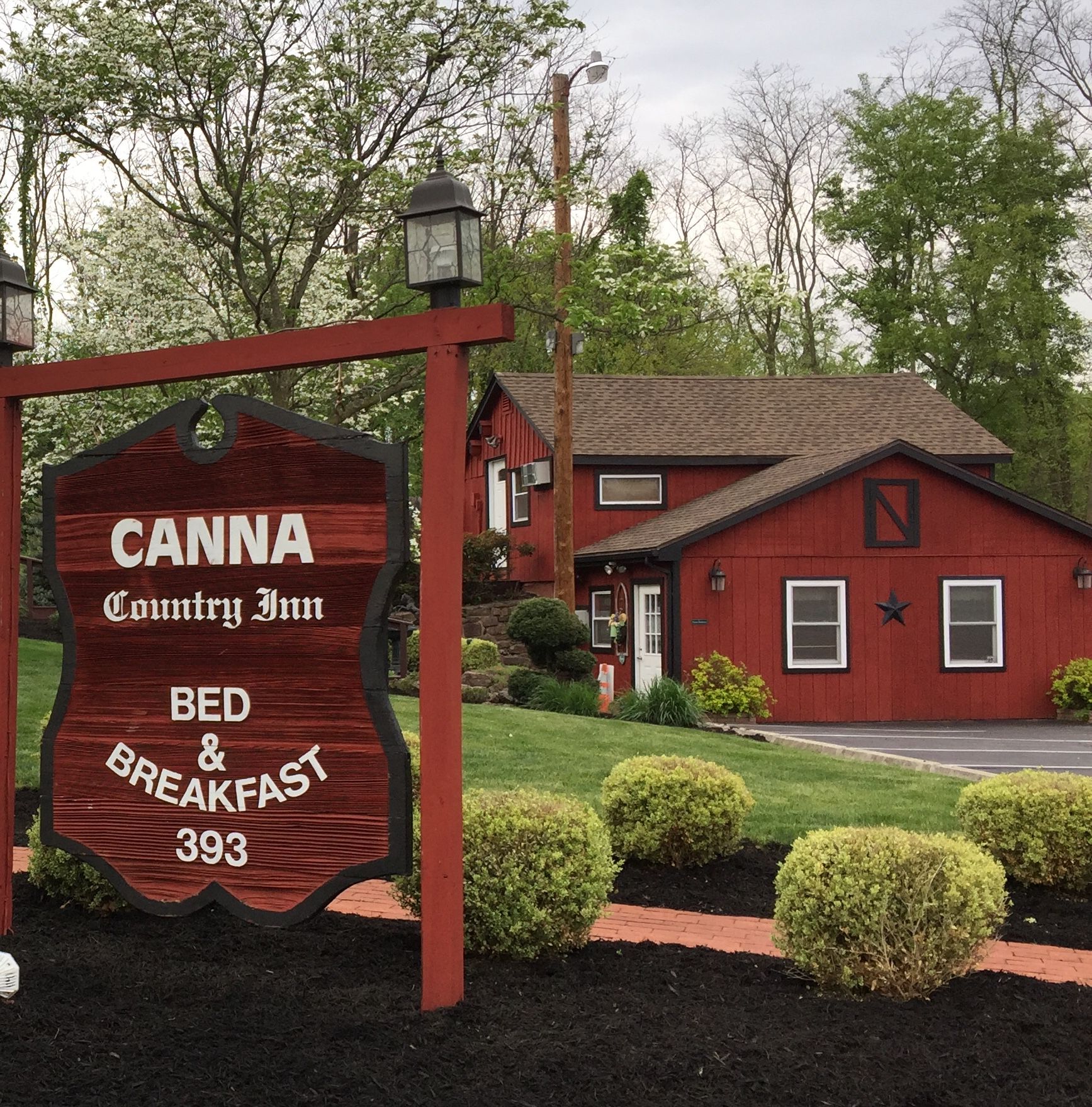 Canna Country Inn with Sign