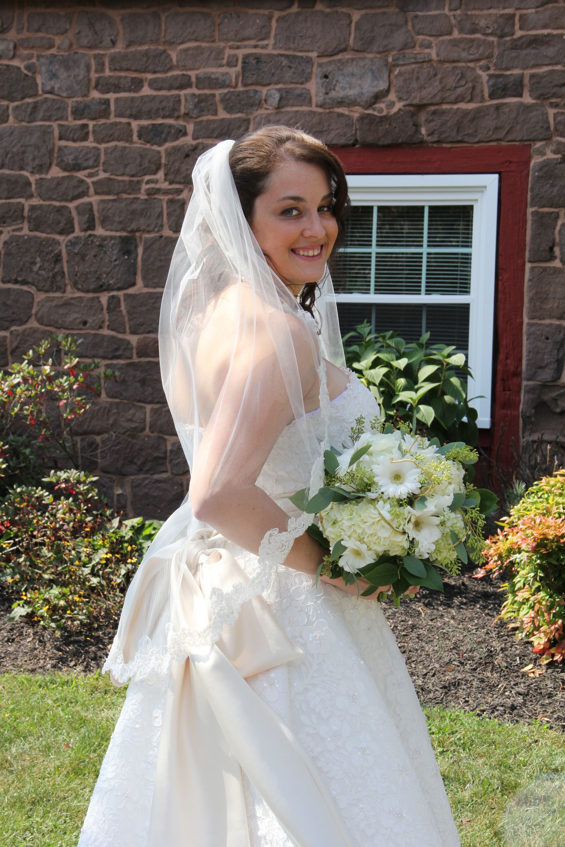 Bride Posing with Flowers