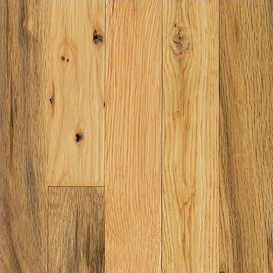 Wooden floorboards in varying shades of light and medium brown, with visible wood grain and knots.