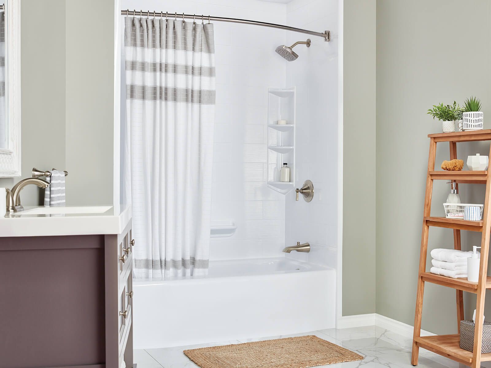 White bathroom with a shower/tub, shelves, and a wooden storage rack.