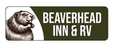 A beaver is holding a cup of coffee in its mouth.