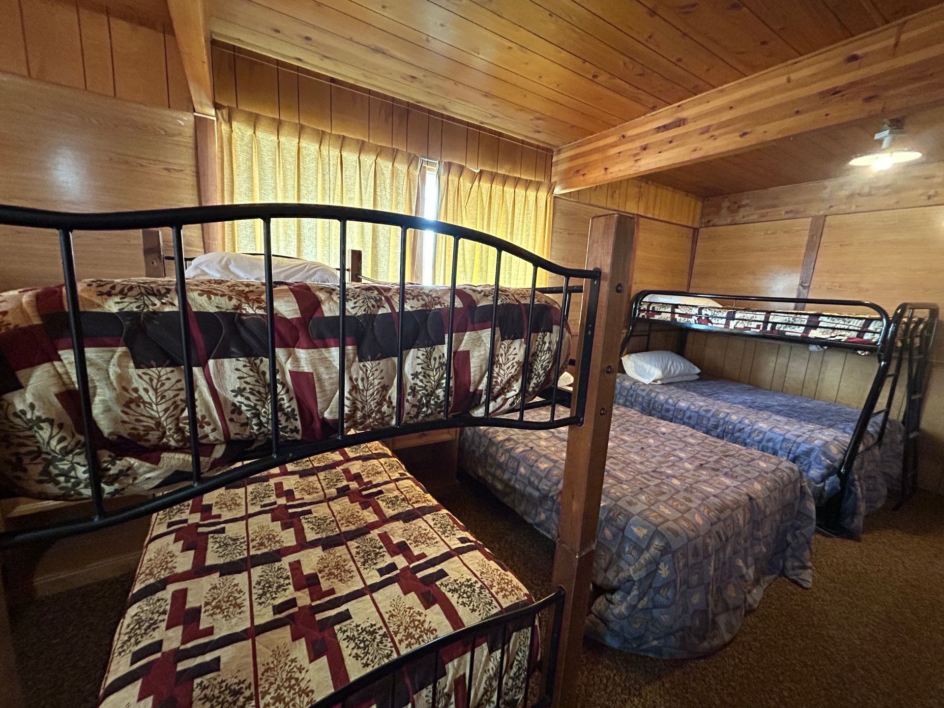 There are three bunk beds in the room.