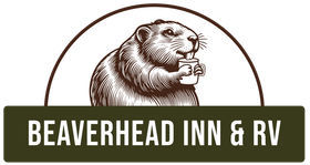 A beaver is holding a cup of coffee in its mouth.