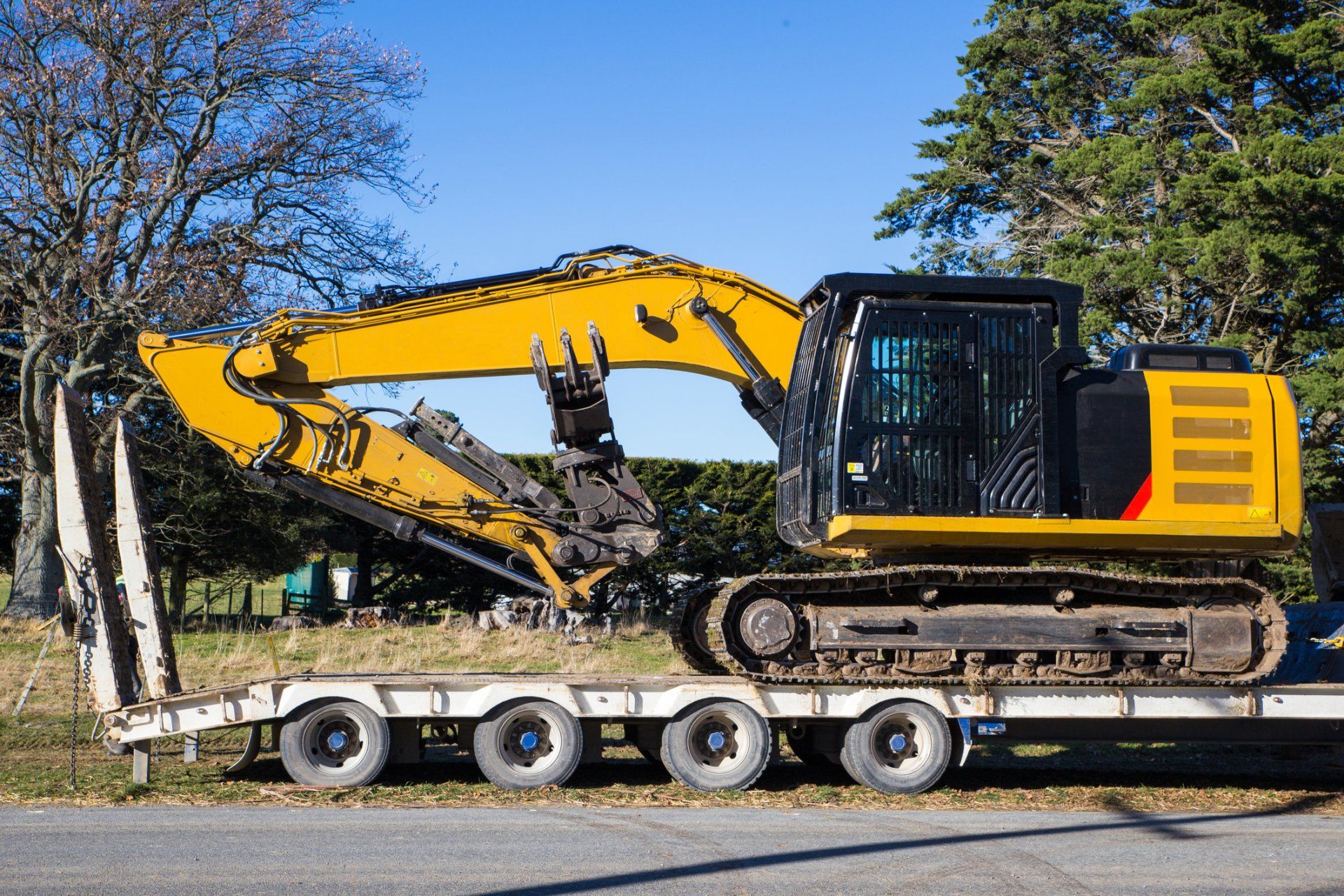 Excavator Loaded on Truck — Cheyenne, WY — Big Al’s Towing & Recovery