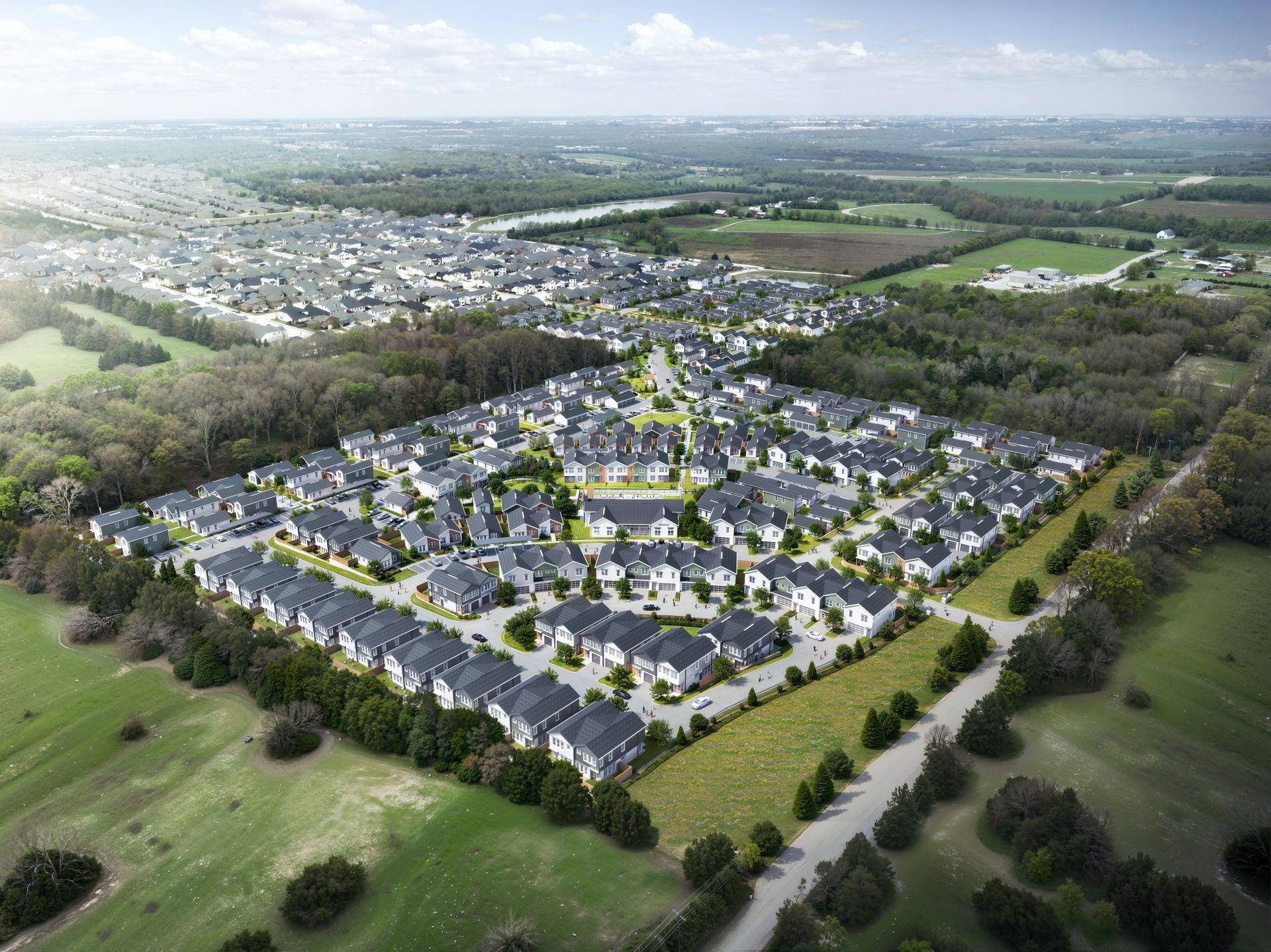 An aerial view of a residential area with lots of houses and trees