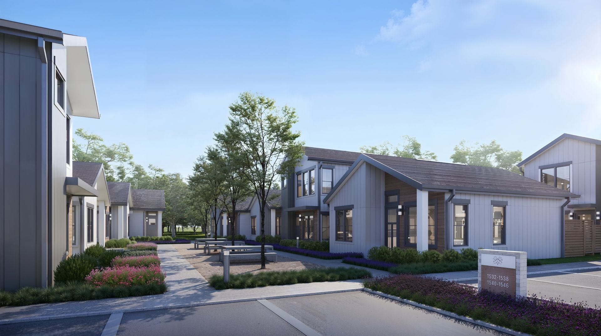 An artist 's impression of a row of houses in a residential area.