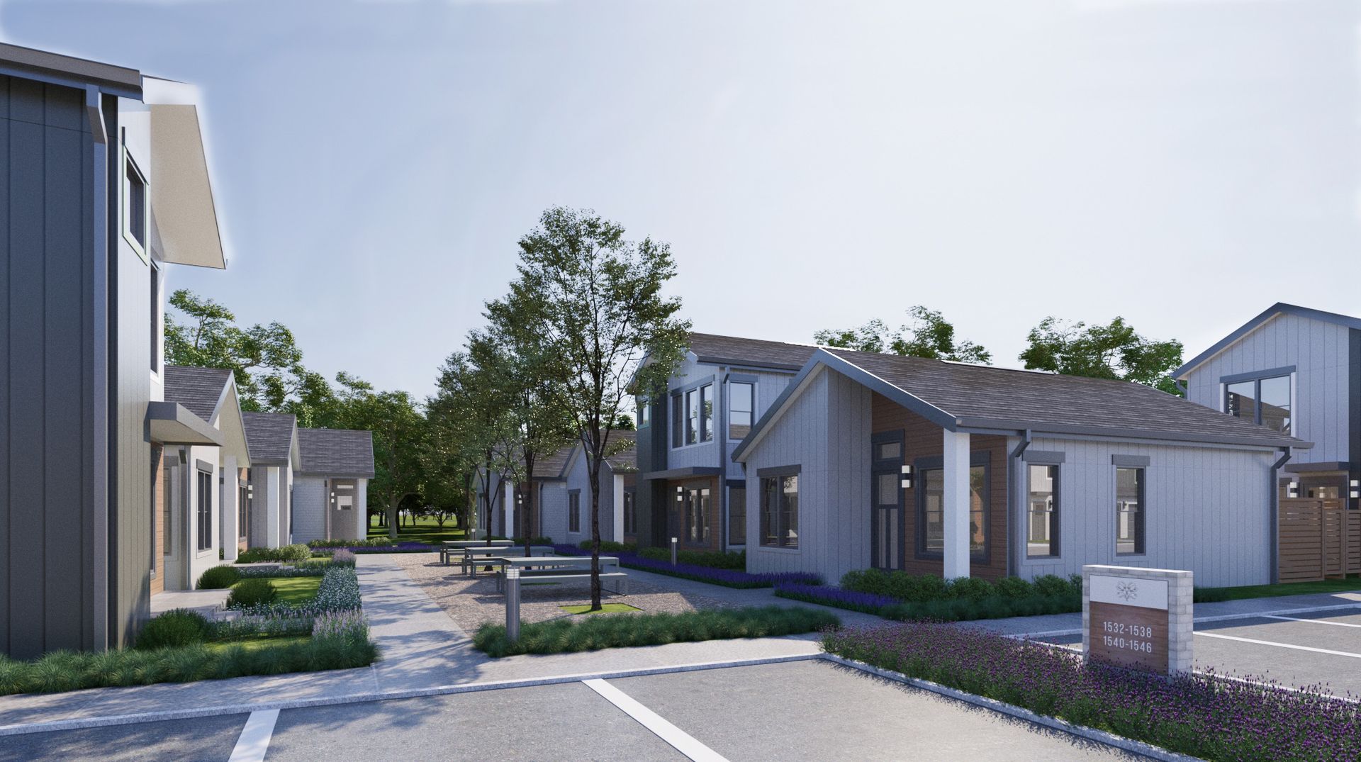 An artist 's impression of a row of houses in a residential area.