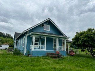 After Exterior Painting to blue view six — Seattle, WA — Cordeck Painting Services LLC