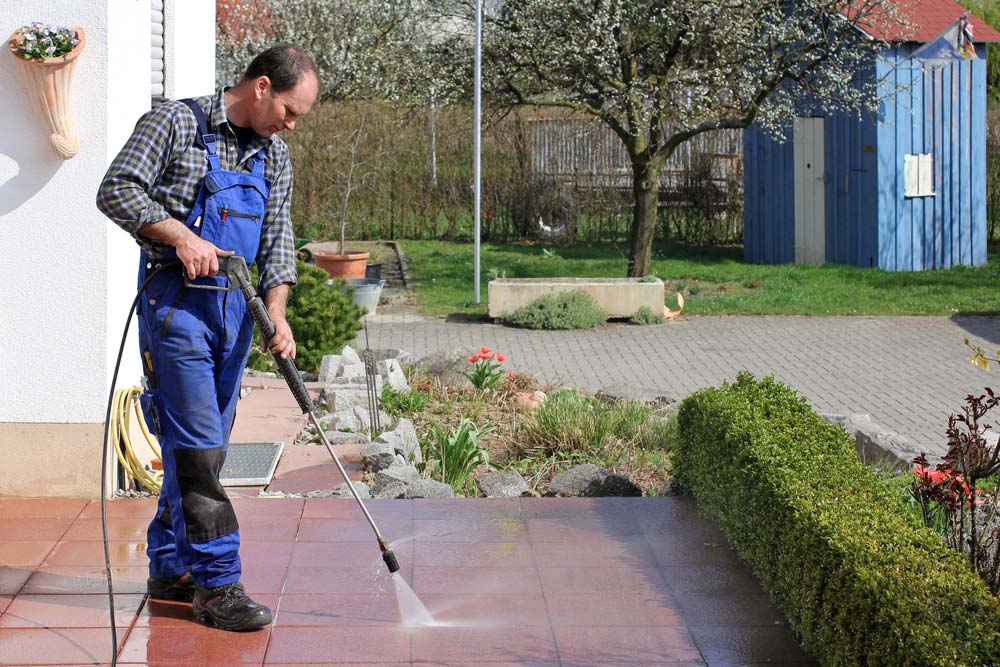 Cleaner Using A Pressure Washer — Professional Cleaners In Tuggerah, NSW