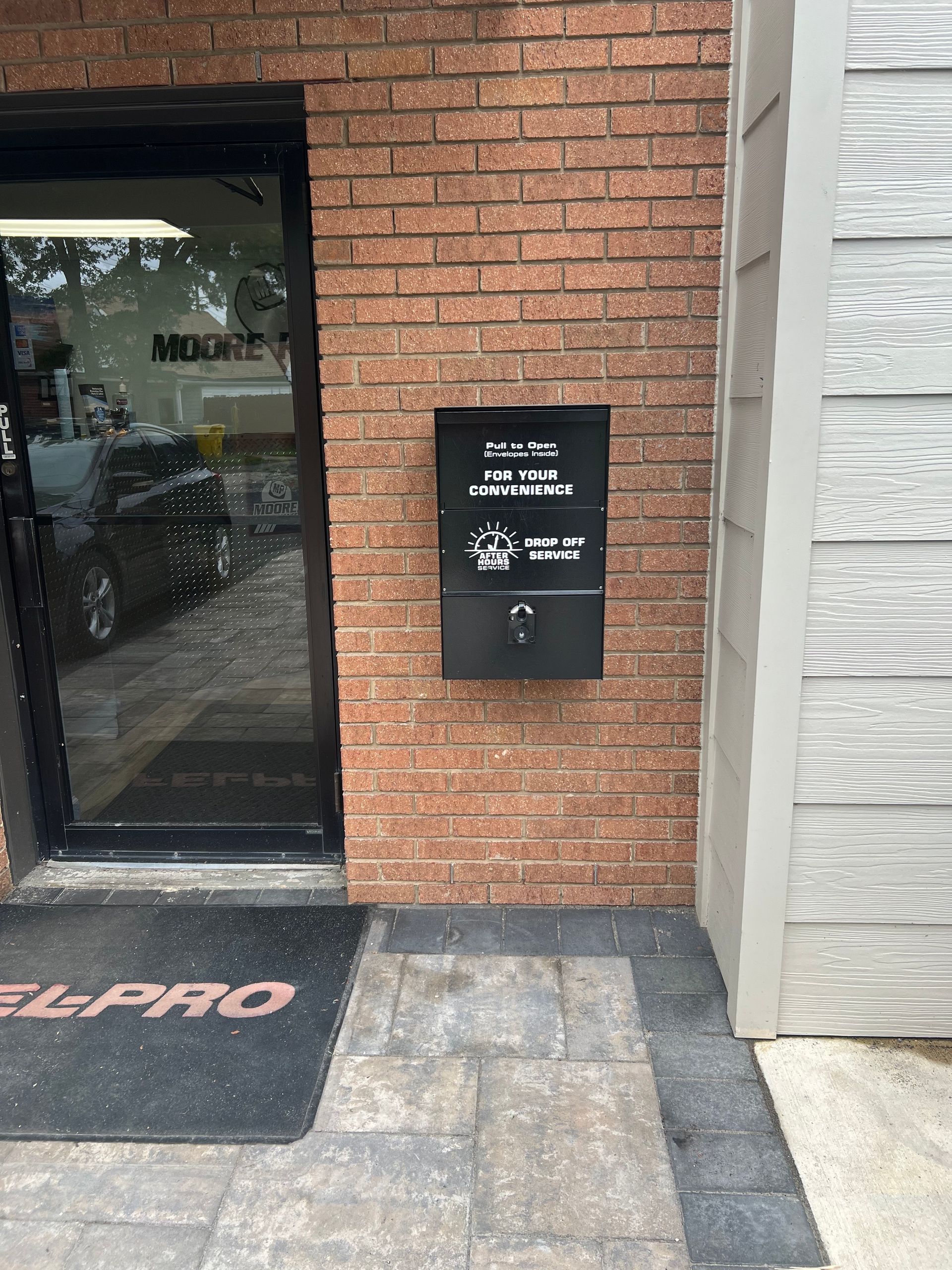 Auto Shop Main Door | Moore Performance