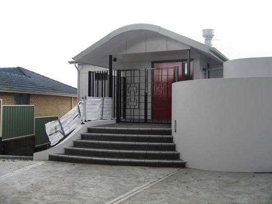 house with steel fence