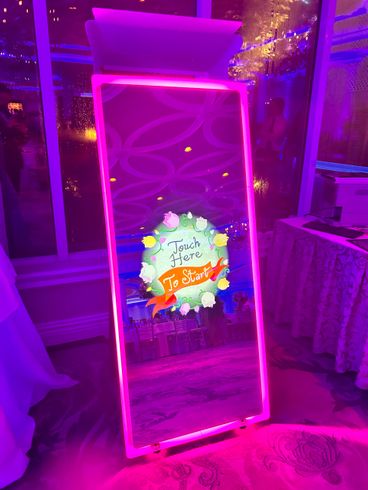 Touch to start animation on Mirror AIR Photo Booth with pink led frame