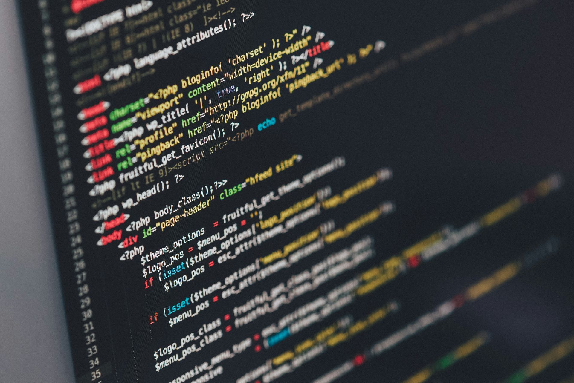 A close up of a computer screen with a lot of code on it.