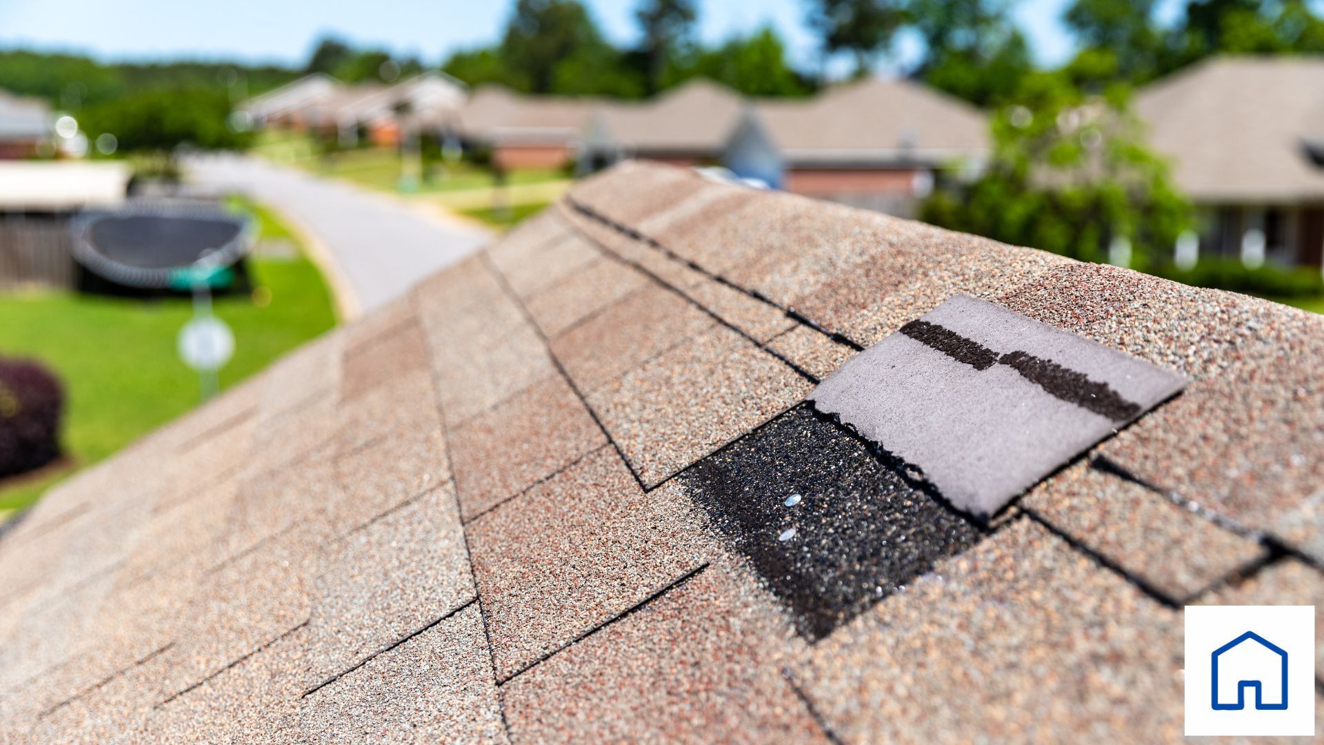 A close up of a roof in Carrollton Ga with damaged shingle