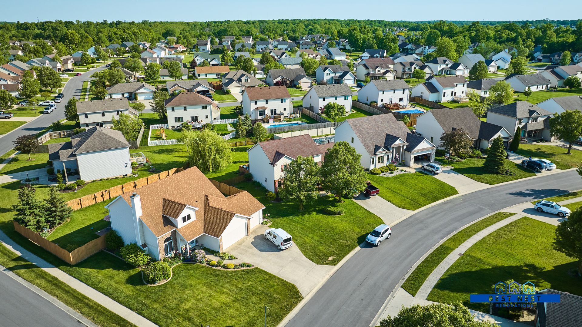 An aerial view of a residential neighborhood in Carrollton Ga with lots of houses and trees.