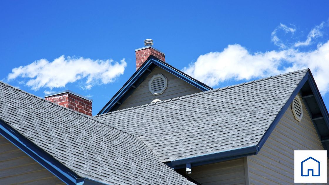 The roof of a house with a chimney on top of it in Carrollton Ga