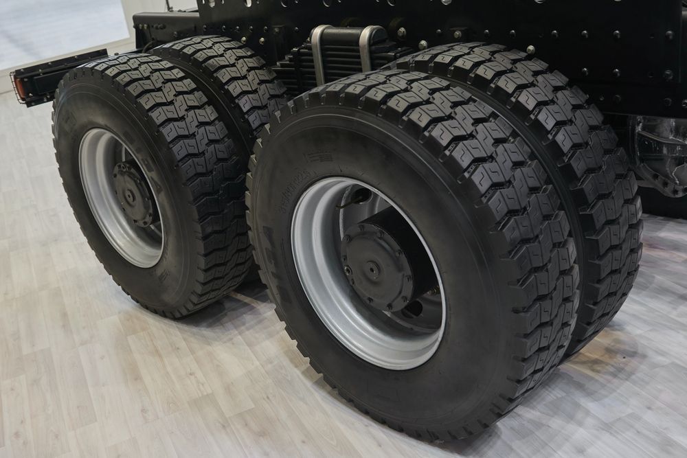 A Close Up of a Truck's Tires on a Wooden Floor — Stamford Tyres In Ballarat Central, VIC