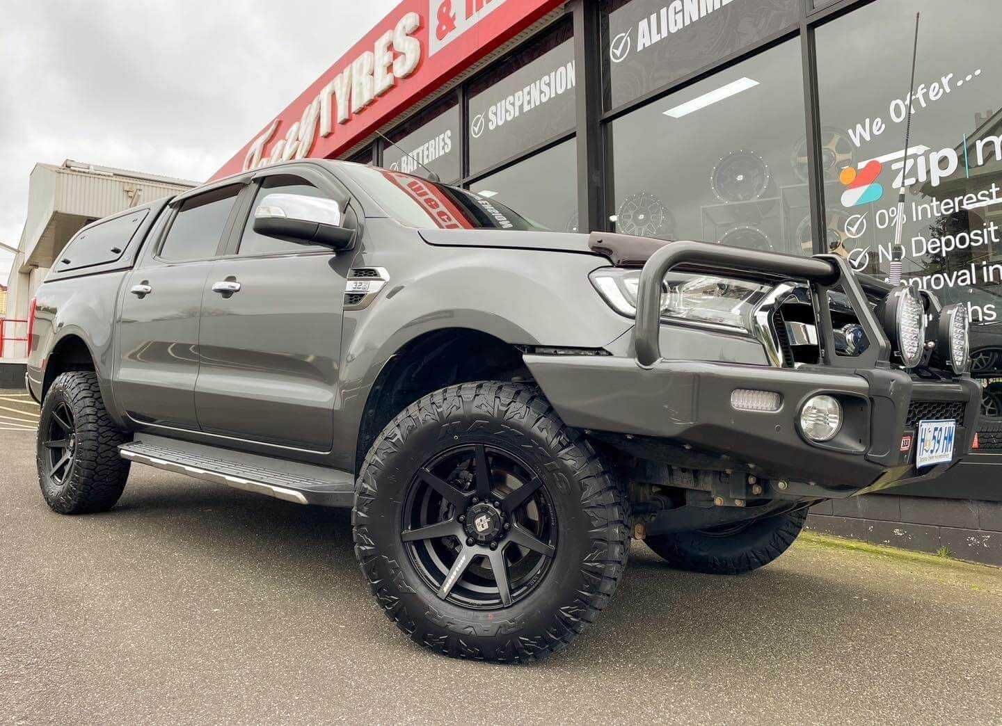 A Ford Ranger is Parked in Front of a Building — Stamford Tyres In Ballarat Central, VIC