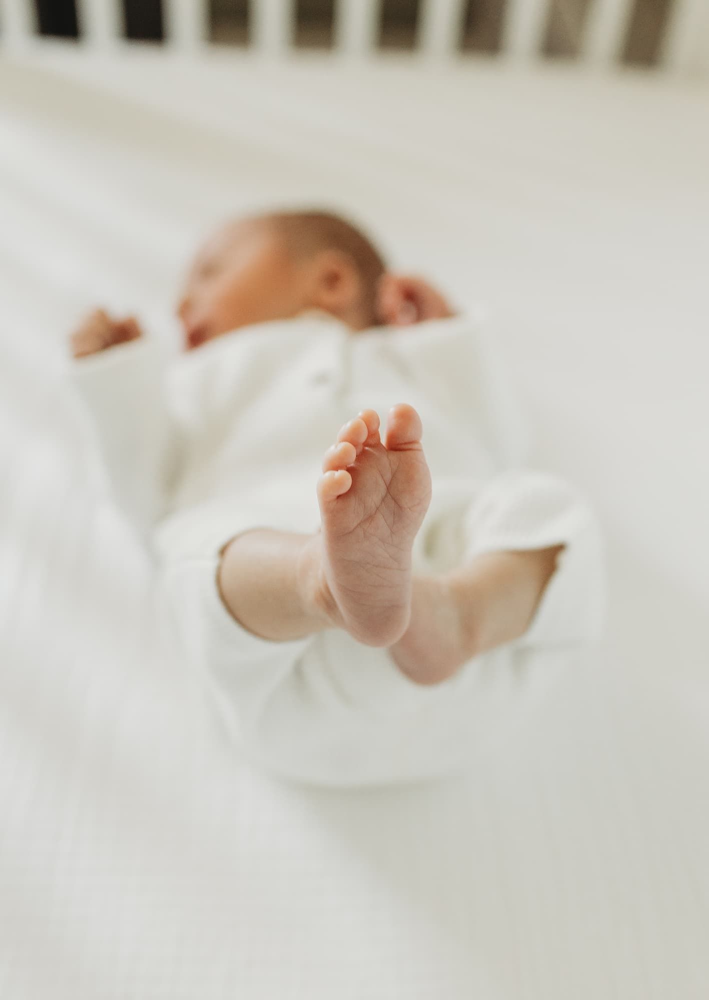 Close-up of newborn baby feet during in-home newborn session in Ridgewood NJ