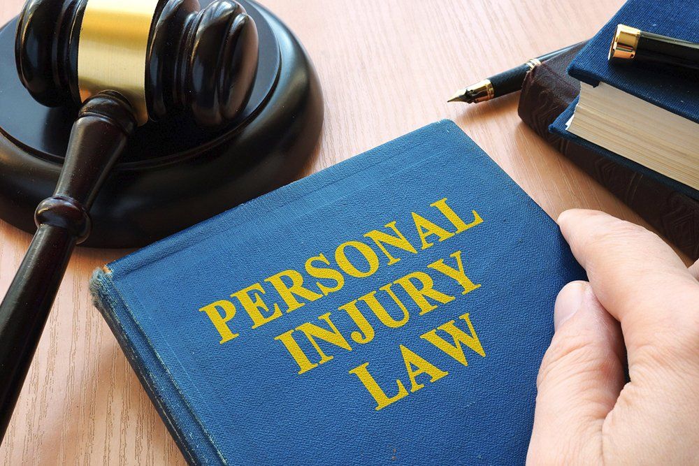 Personal Injury Law and Gavel on a Desk | Gallatin, TN | Pellegrin & Associates
