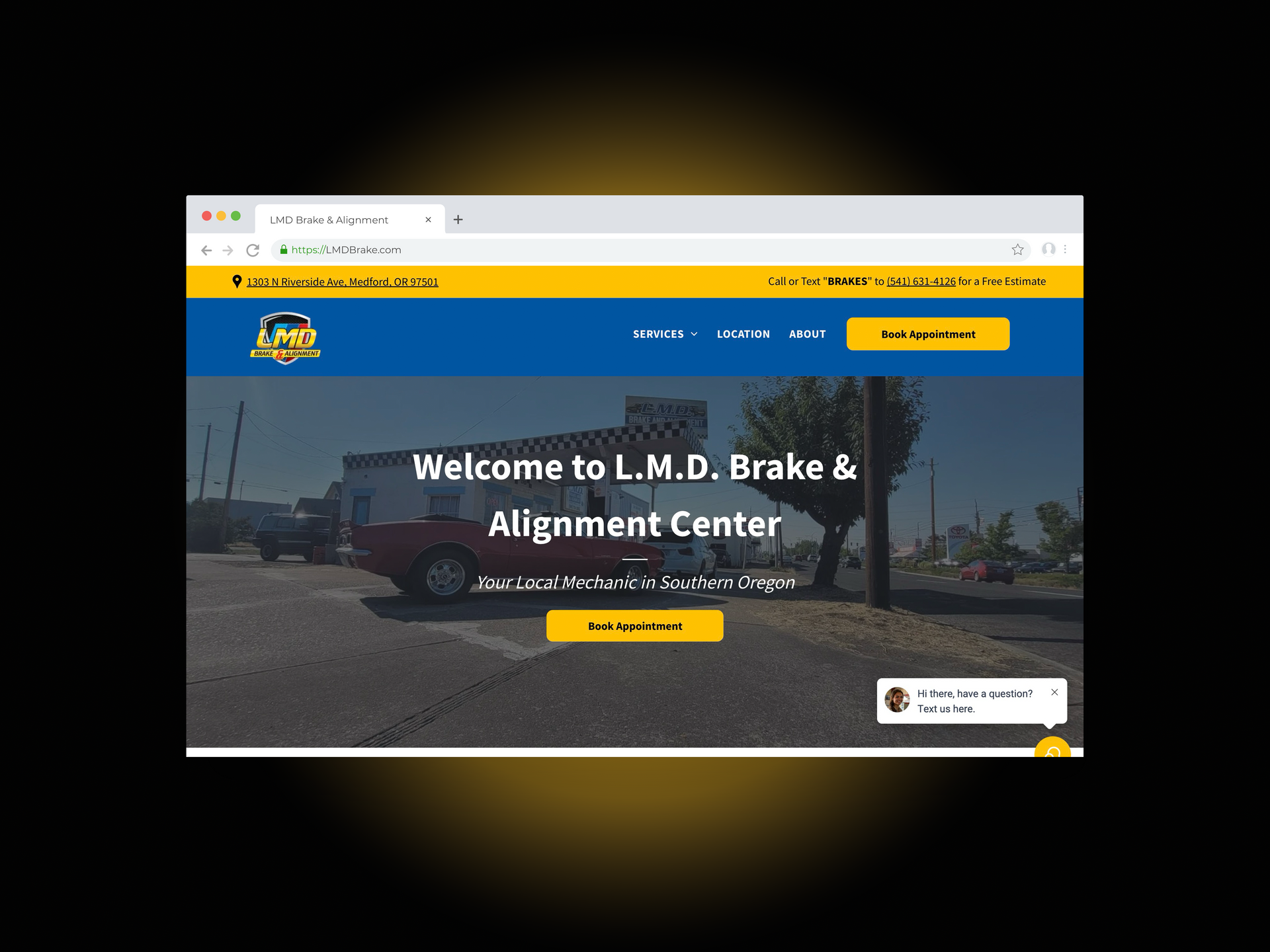 A computer screen shows a website for a brake repair shop.