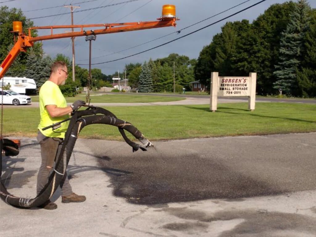 Asphalt Repair job being done by Dublin Commercial Property Services in Port Clinton, OH