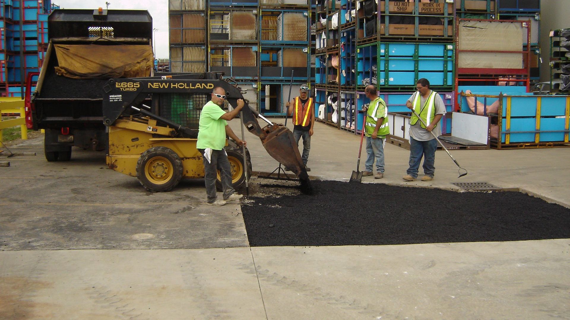 Asphalt work - pouring asphalt