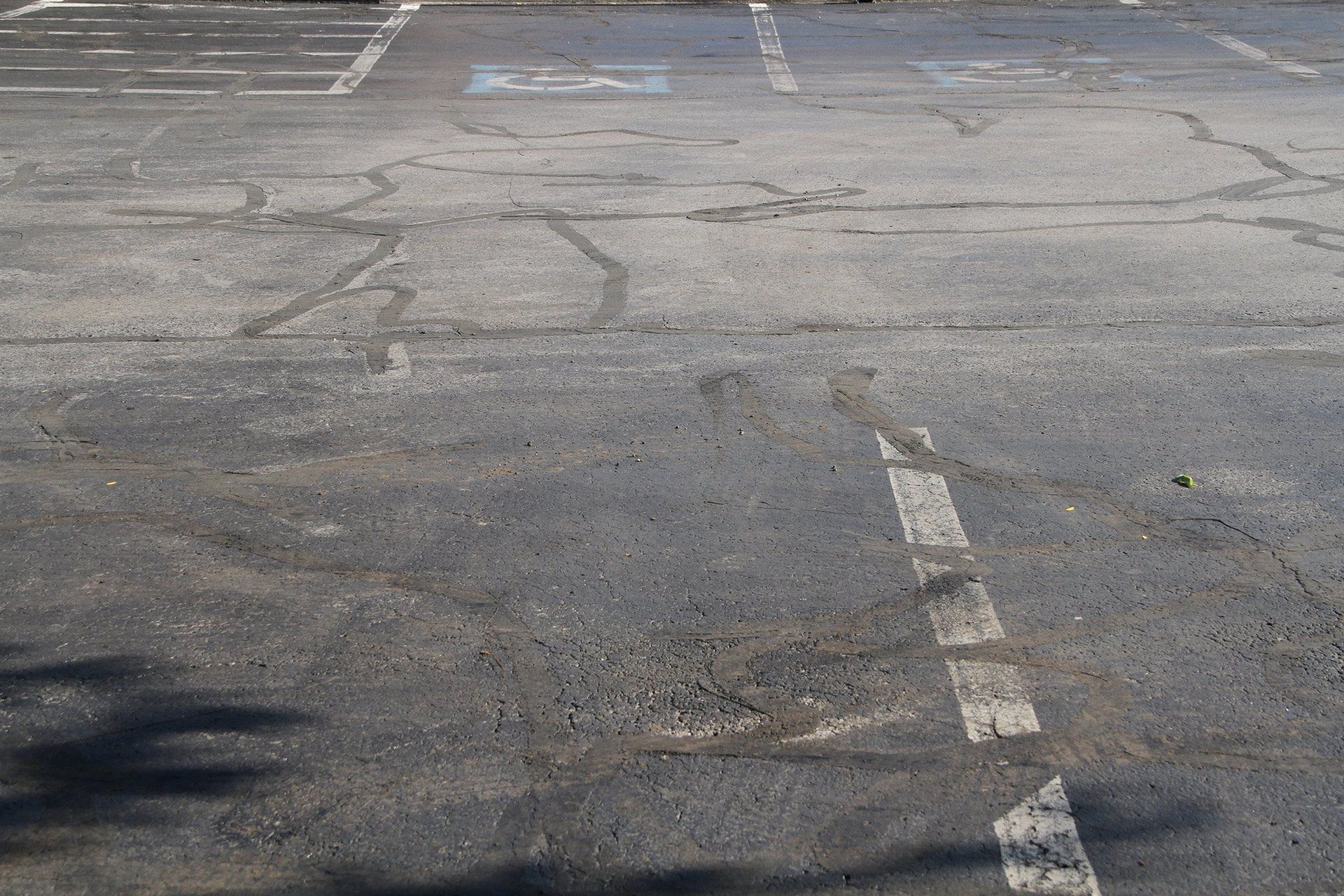 Parking lot with faded striping