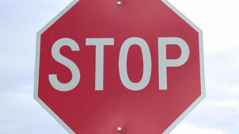 Sign Installation Services. A stop sign.