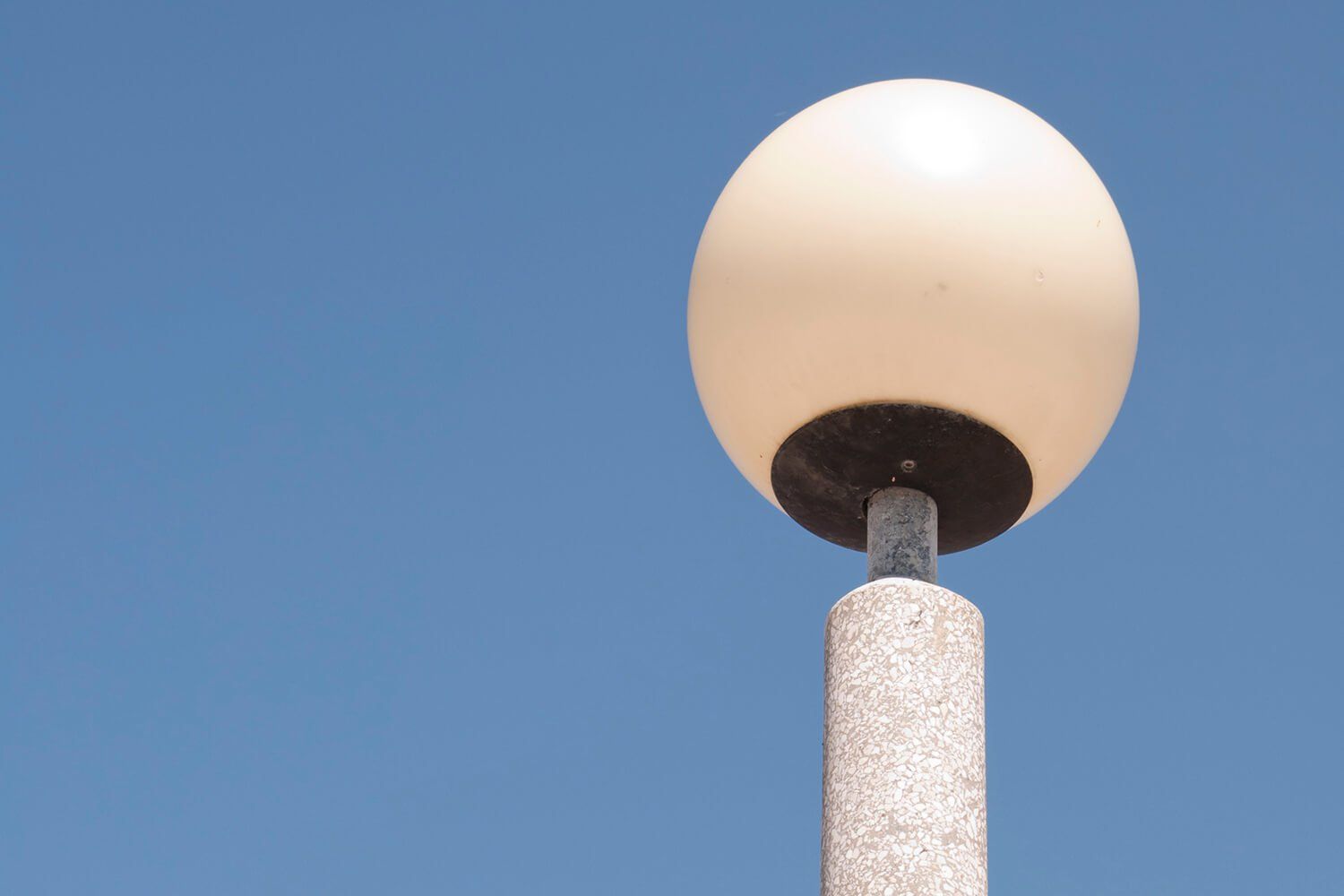 Lighting Maintenance. A commercial light pole.