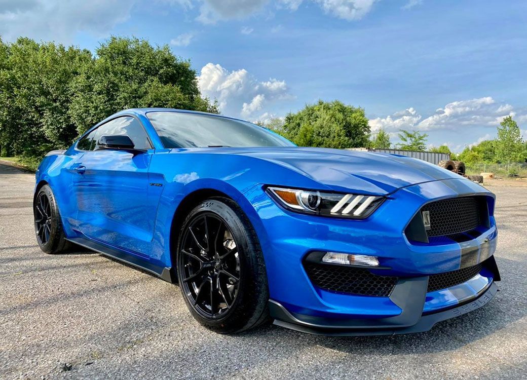 Paint protection film in Huntsville offers superior protection for vehicle during summer road trips.