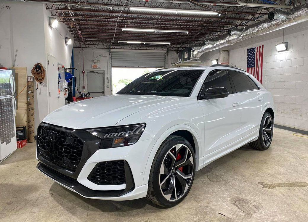 Side-by-side comparison of ceramic coating vs wax in Huntsville, highlighting long-term car protection benefits.