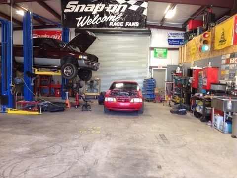 Break Repair — Red Car On Repair Shop in Franklin, North Carolina