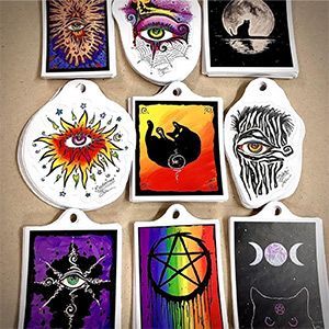 A bunch of stickers with different designs on them