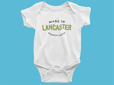 A baby onesie that says made in lancaster pennsylvania