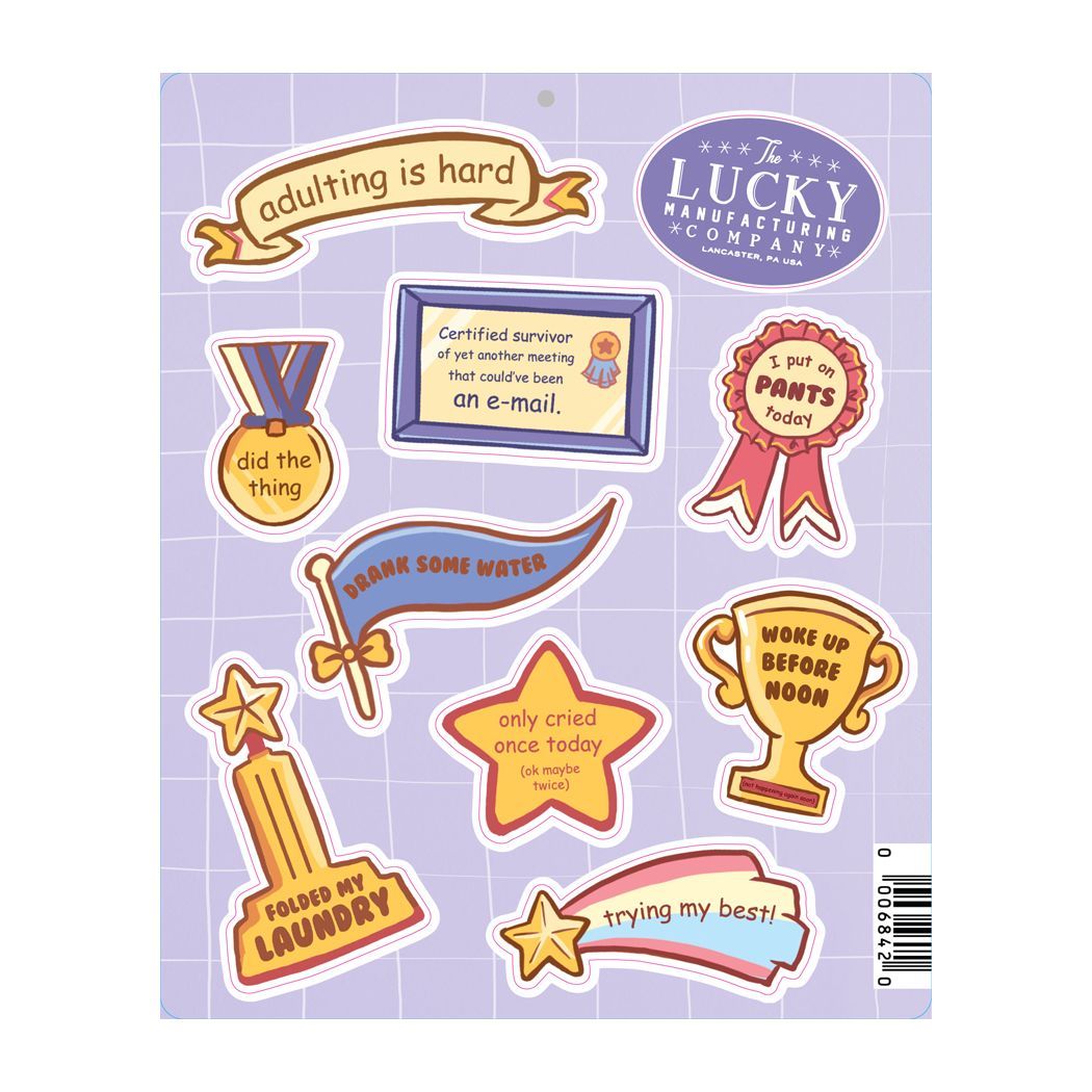 A set of stickers with a ruler next to them.