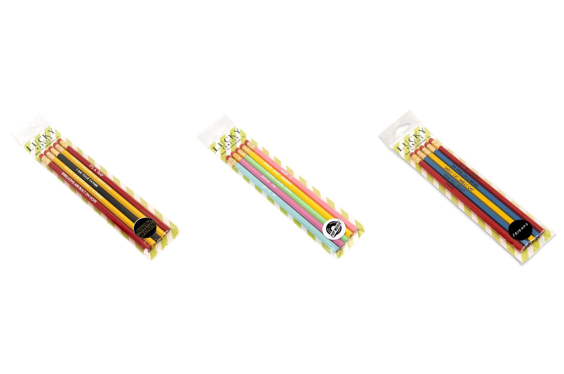 A group of lucky pencils are sitting next to each other on a table.