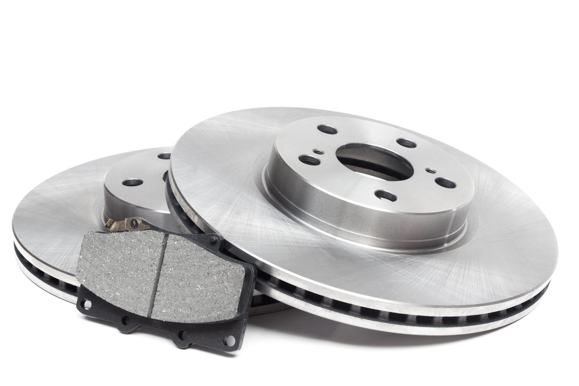 A pair of brake pads and rotors on a white background.