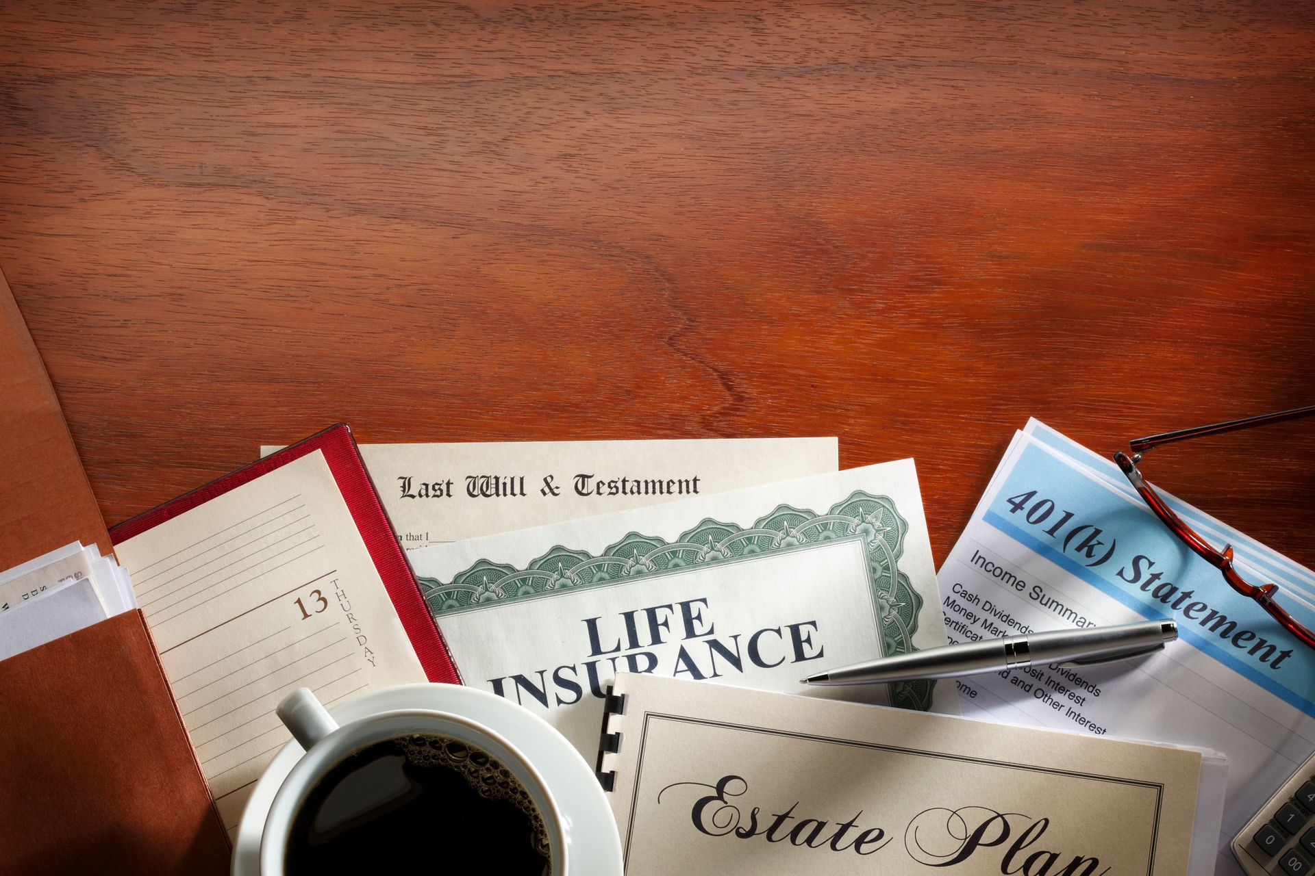 A Cup Of Coffee Sits On A Table Next To A Life Insurance Certificate — Dallas, TX — Misteli Law Firm