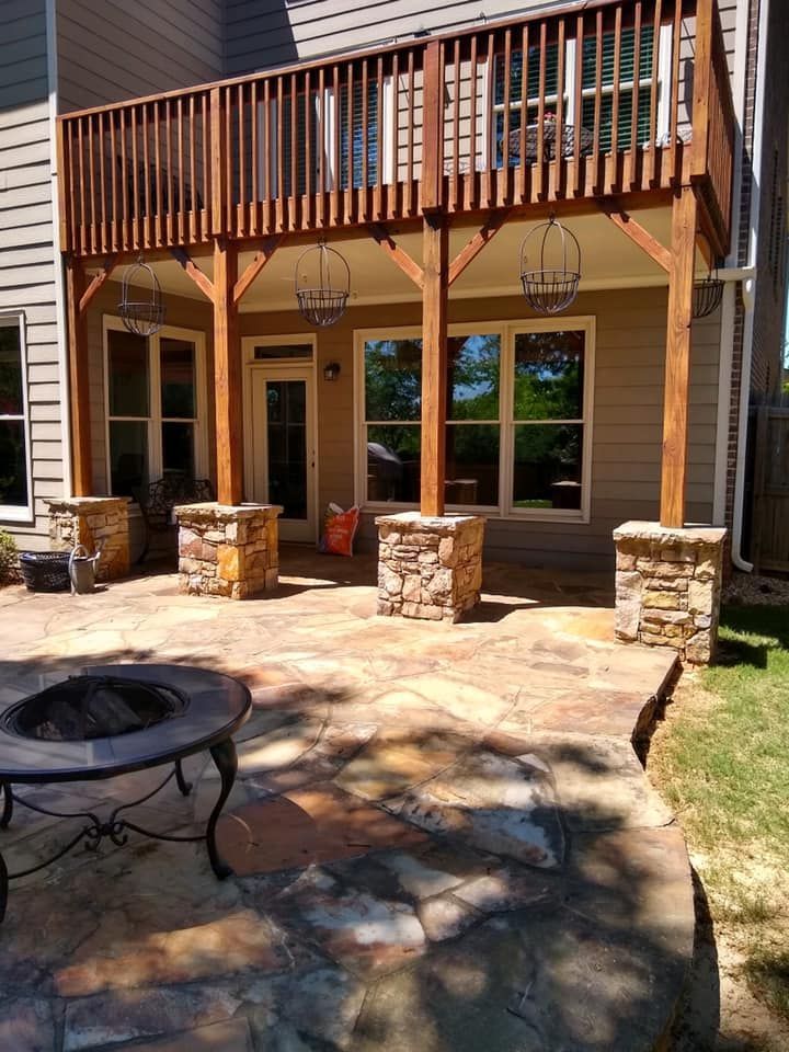 There is a fire pit on the patio under the deck.