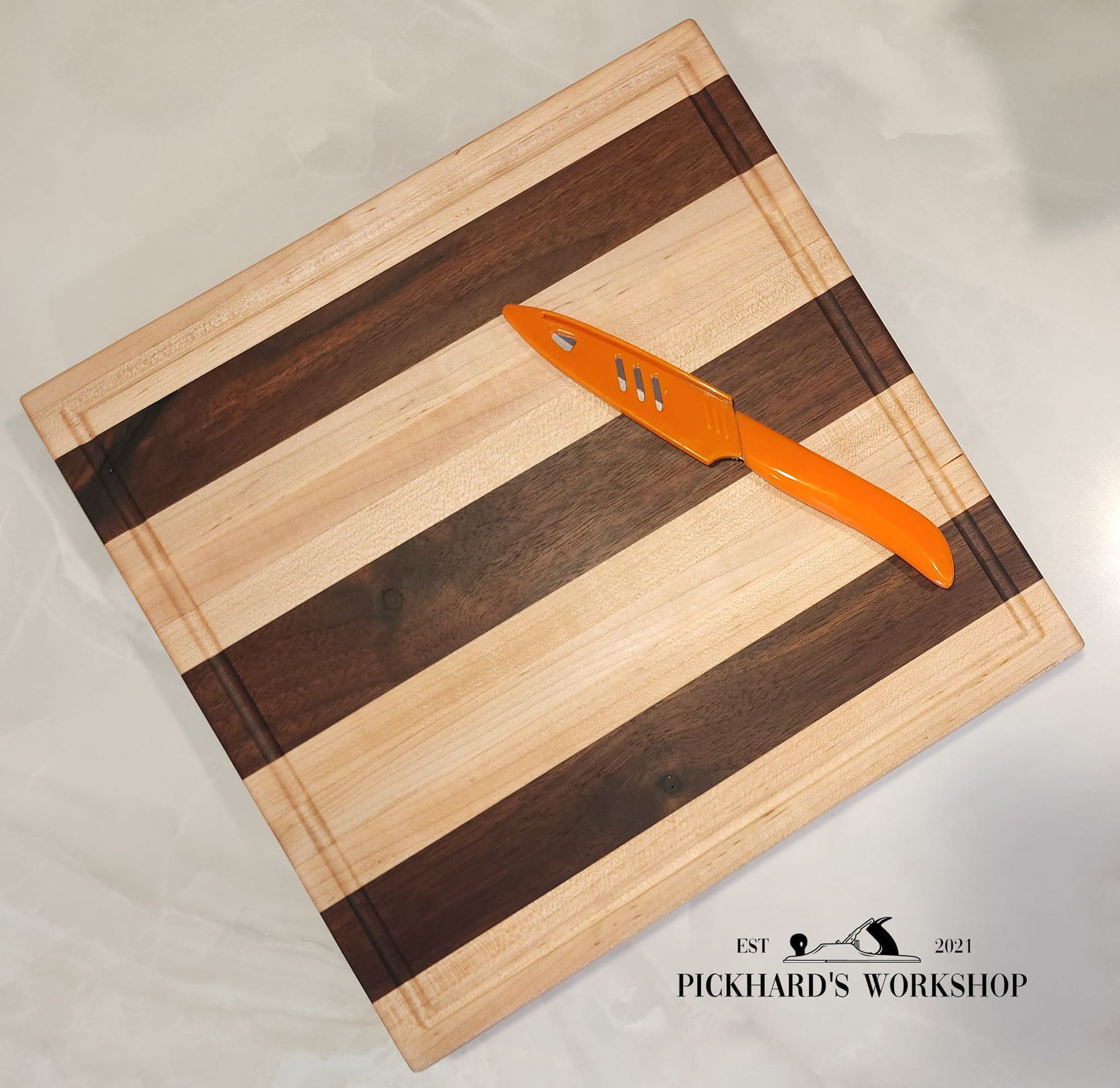 Pickhard's Workshop, Wood County WI, Marathon County WI, Marshfield WI, Hewitt WI, McMillan WI, Spencer WI, Spokeville WI, Unity WI, Colby WI, Abbotsford WI, Stratford WI, Auburndale WI, Junction City WI, Stevens Point WI, Arpin WI, Vesper WI, Pittsville WI, Granton WI, Neillsville WI, Lynn WI, Loyal WI, Greenwood WI, Carpentry, Carpenter, Carpenter Near Me, Home Improvement, Home Improvement Services Near Me, Custom Dining Table, Custom Coffee Table, Laser Engraving Near Me, Custom Laser Engraving, Photo Laser Engraving, CnC Engraving, Woodworking, Custom Woodworking, Custom Cutting Boards, Cutting boards, Table Design and Building, Custom Tables, Custom Wall Decor, Custom Flags, Military Flags, Police Flags, Custom American Flags, Epoxy Tables, Custom Epoxy Tables, Wood Countertops, Custom Wood Countertops, Wood Countertop Installation, Cabinet Installation, Cabinet Repair, Cabinet Repair Near Me