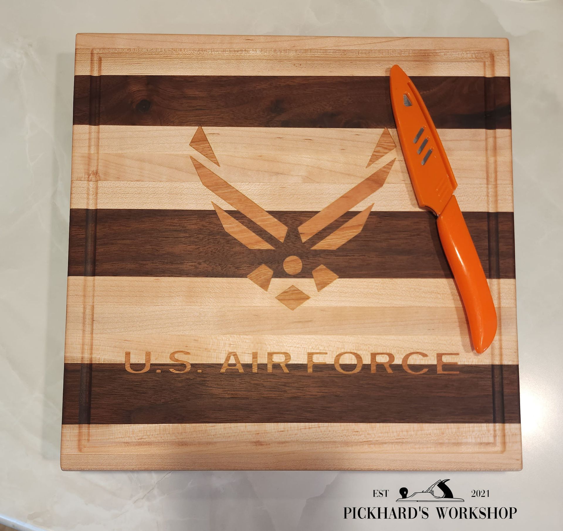 Pickhard's Workshop, Wood County WI, Marathon County WI, Marshfield WI, Hewitt WI, McMillan WI, Spencer WI, Spokeville WI, Unity WI, Colby WI, Abbotsford WI, Stratford WI, Auburndale WI, Junction City WI, Stevens Point WI, Arpin WI, Vesper WI, Pittsville WI, Granton WI, Neillsville WI, Lynn WI, Loyal WI, Greenwood WI, Carpentry, Carpenter, Carpenter Near Me, Home Improvement, Home Improvement Services Near Me, Custom Dining Table, Custom Coffee Table, Laser Engraving Near Me, Custom Laser Engraving, Photo Laser Engraving, CnC Engraving, Woodworking, Custom Woodworking, Custom Cutting Boards, Cutting boards, Table Design and Building, Custom Tables, Custom Wall Decor, Custom Flags, Military Flags, Police Flags, Custom American Flags, Epoxy Tables, Custom Epoxy Tables, Wood Countertops, Custom Wood Countertops, Wood Countertop Installation, Cabinet Installation, Cabinet Repair, Cabinet Repair Near Me