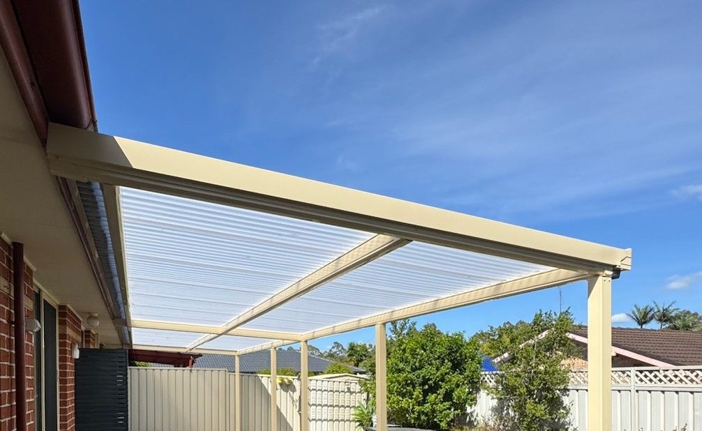 Sunroom With Cream Walls, Windows, and a Black Roof — Narellan Home Improvement Centre In Narellan, NSW
